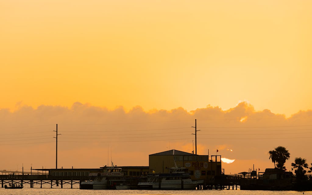 The sun sets over South Padre Island on June 9, 2021.