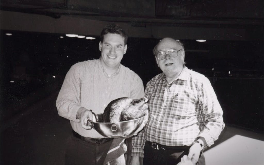 Chester and Sweany in the parking lot of the Omni building where they had just deep-fried a turkey as part of testing a recipe for the November 1998 issue.