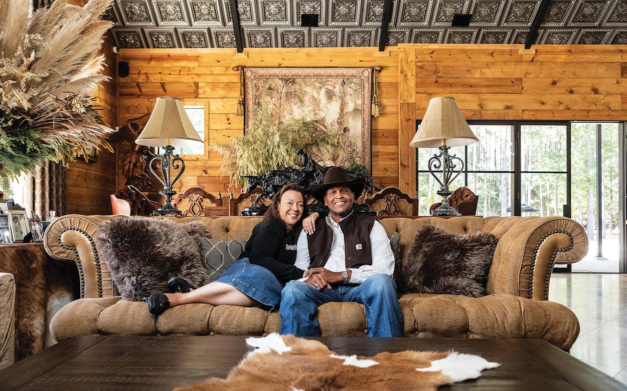 Stacee Lynn and Oliver Bell in their barndominium, near Cleveland, on November 8, 2021.