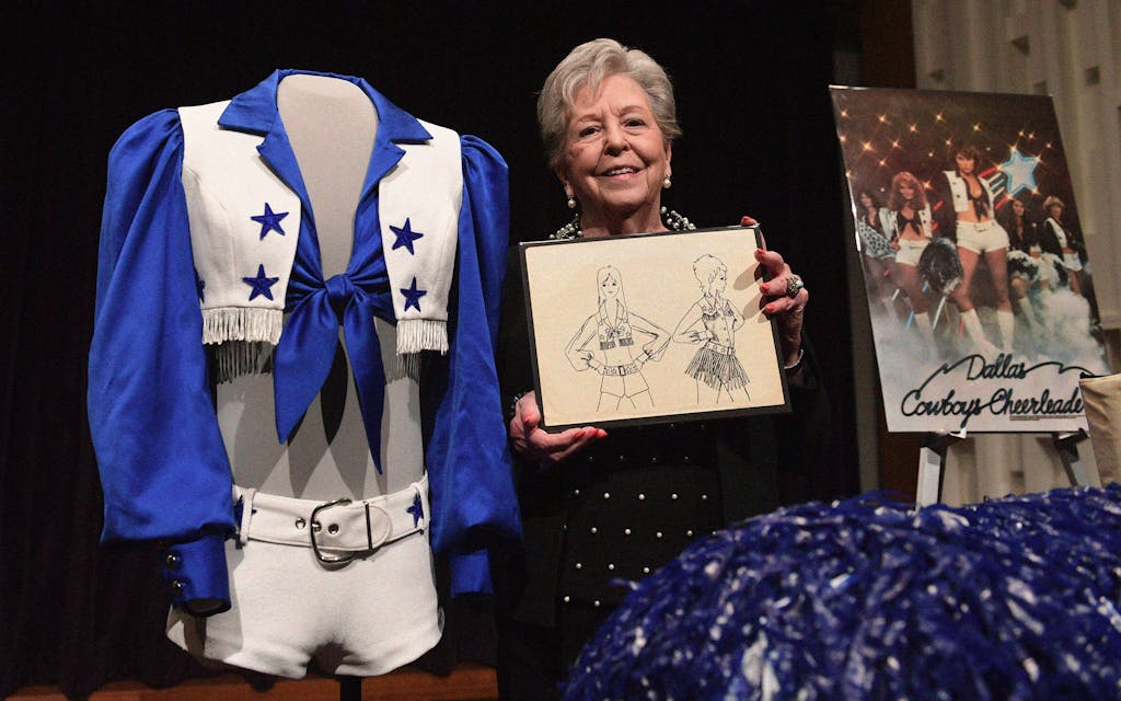 Paula Van Wagoner holds her sketch of the original Dallas Cowboys uniform that she designed.