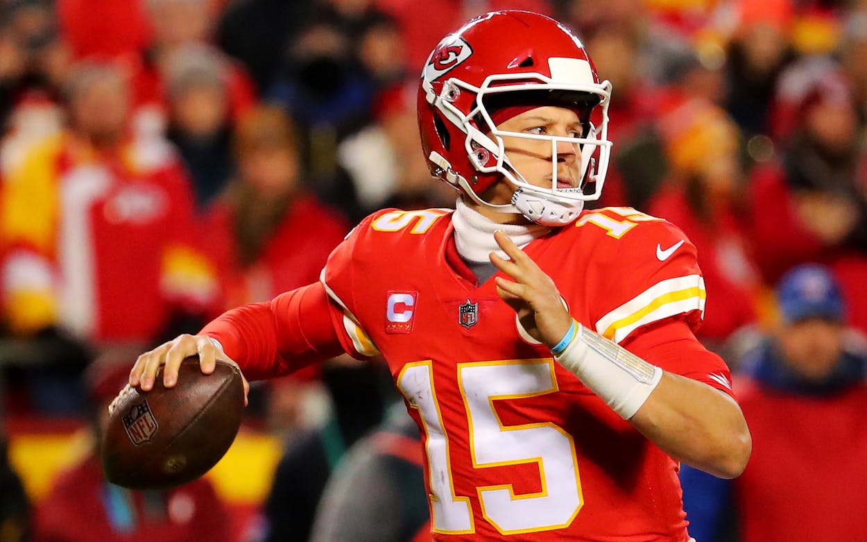 Patrick Mahomes #15 of the Kansas City Chiefs looks to pass the ball during the game against the Pittsburgh Steelers in the NFC Wild Card Playoff game at Arrowhead Stadium on January 16, 2022 in Kansas City, Missouri.
