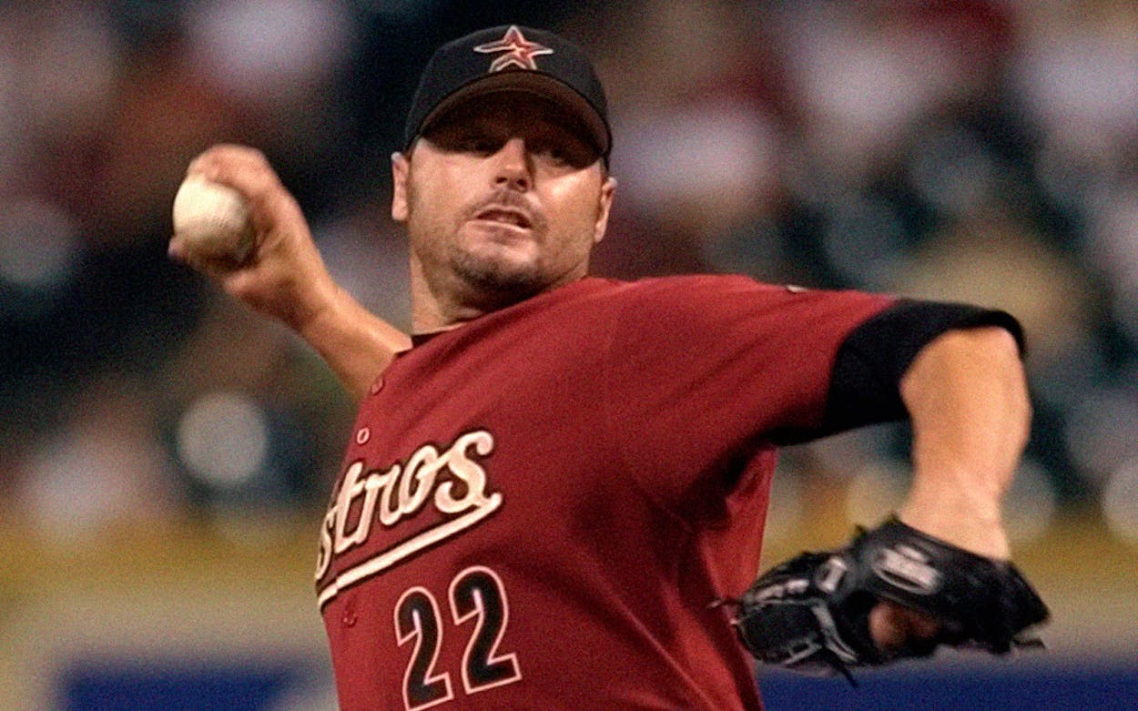 Houston Astros starting pitcher Roger Clemens delivers a pitch in the first inning against the Milwaukee Brewers Sunday, Sept. 19, 2004, in Houston.