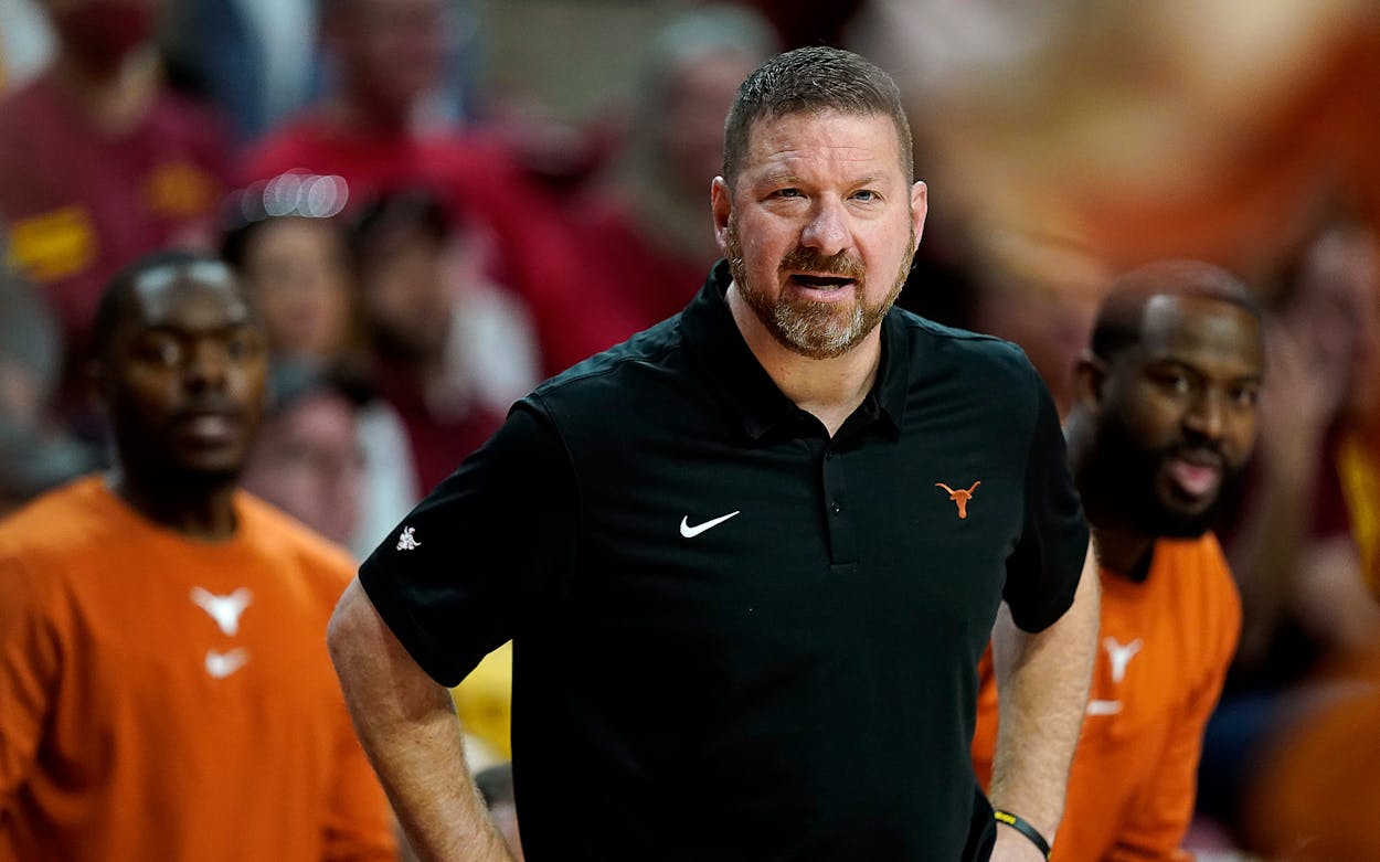 Texas head coach Chris Beard watches from the bench during the first half of an NCAA college basketball game against Iowa State, Saturday, Jan. 15, 2022, in Ames, Iowa.