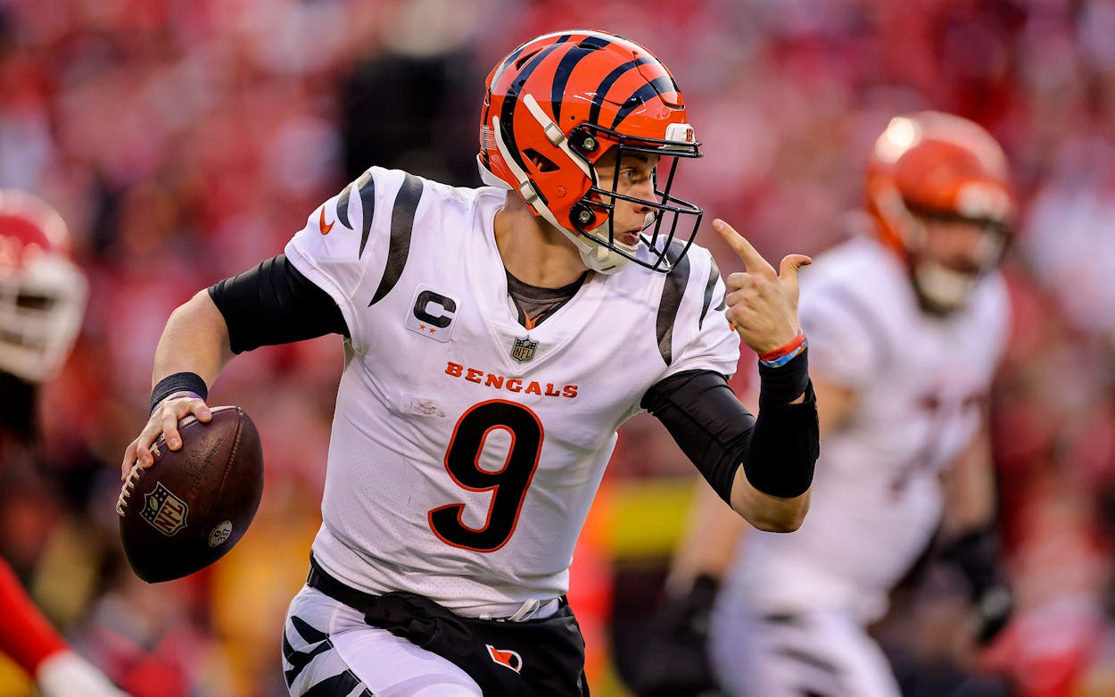 Joe Burrow #9 of the Cincinnati Bengals runs with the football during the fourth quarter of the AFC Championship Game against the Kansas City Chiefs at Arrowhead Stadium on January 30, 2022 in Kansas City, Missouri, United States.