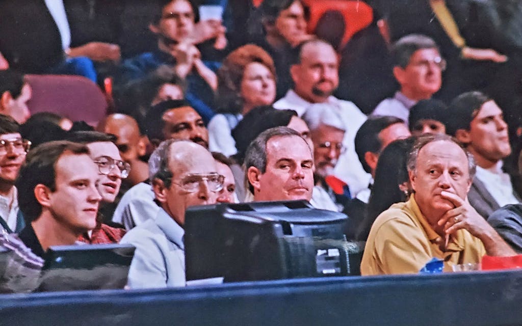 Larry Stick carefully watches play at [HOUSTON ROCKETS?] game in YEARTK.
