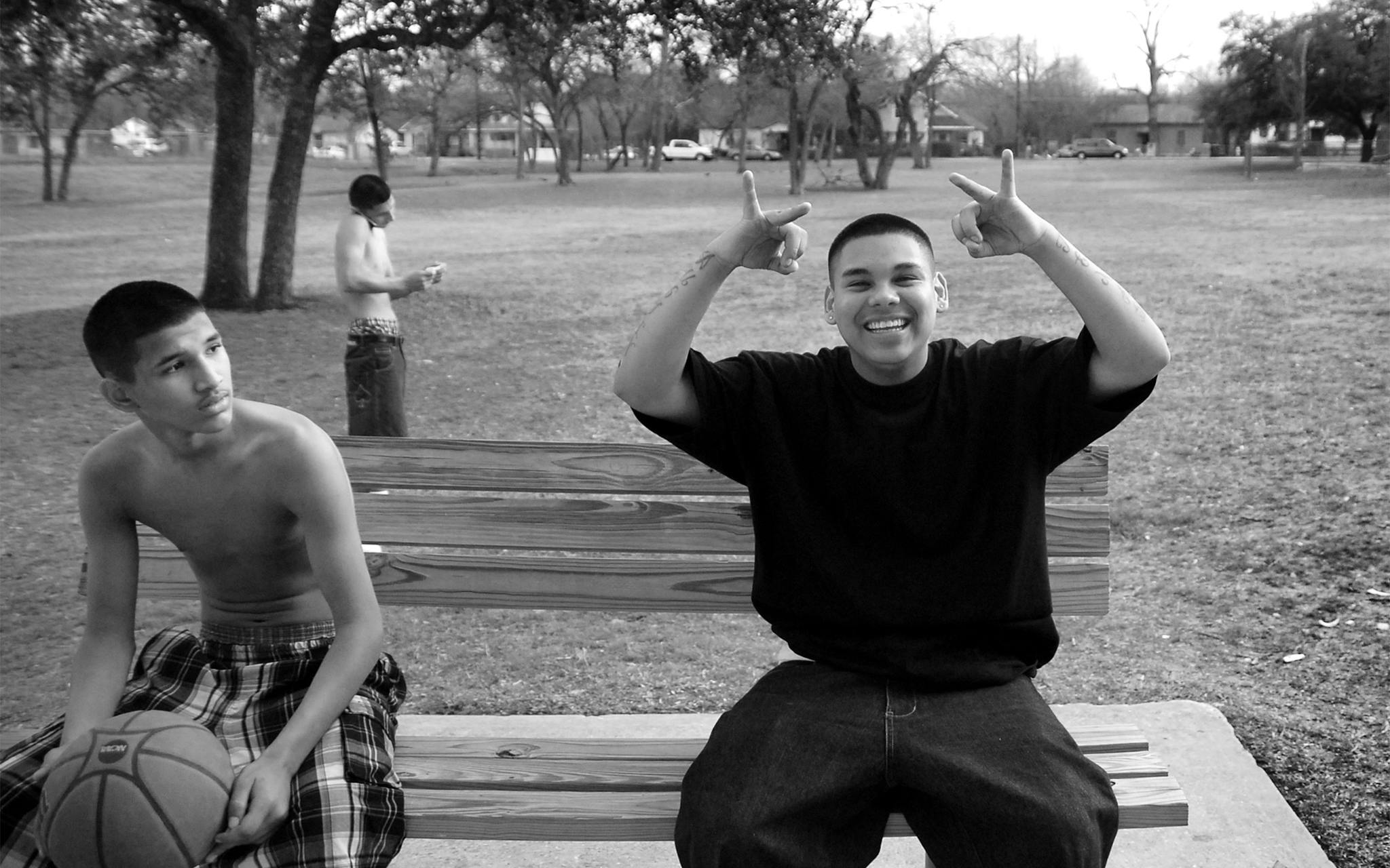 Christian with Josh Fabela, who is flashing the “0-2” sign, across the street from Booker T. on February 25, 2009.
