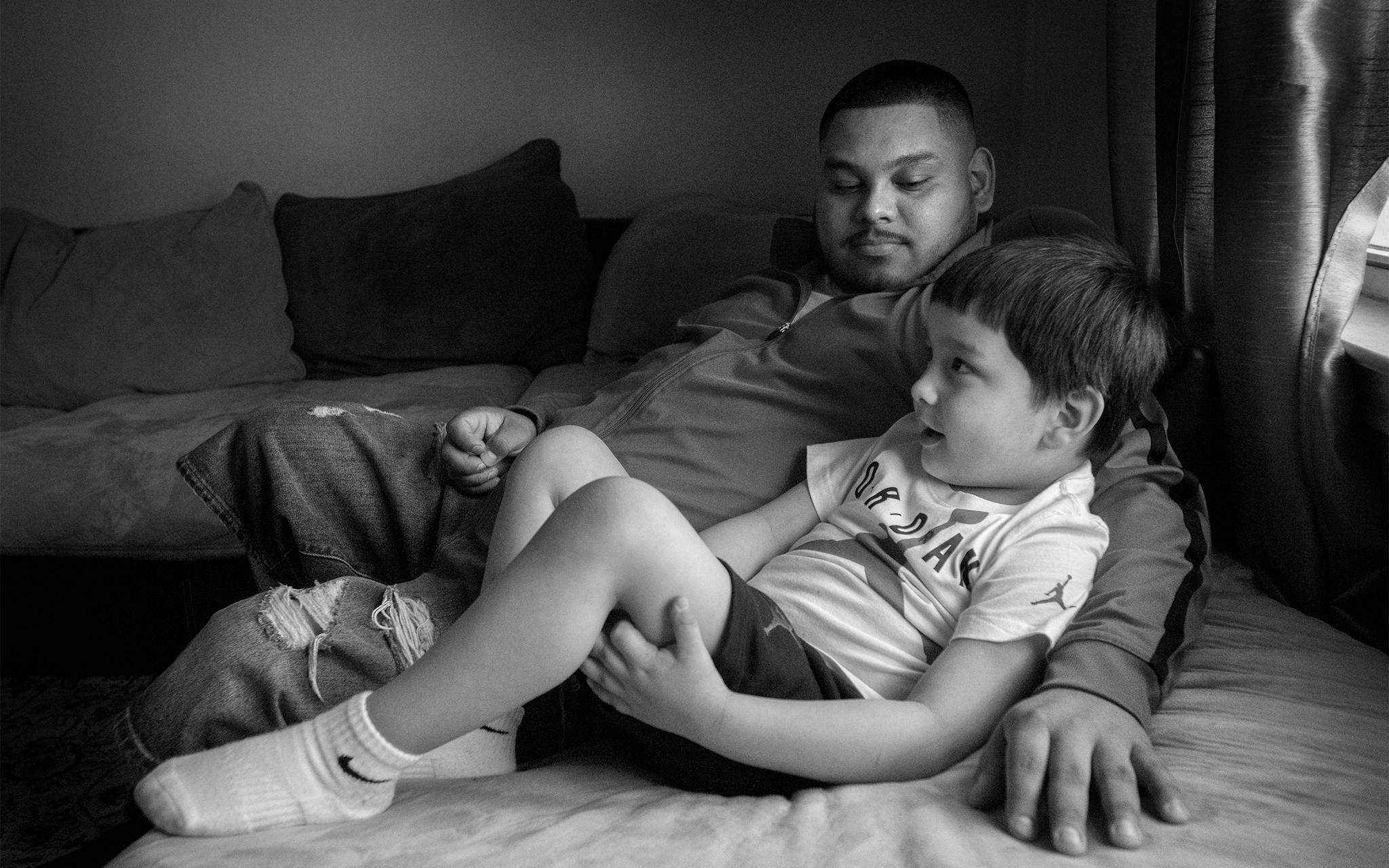 Josh Fabela with his four-year-old son Joshua Jr. at their Austin apartment on February 8, 2020.