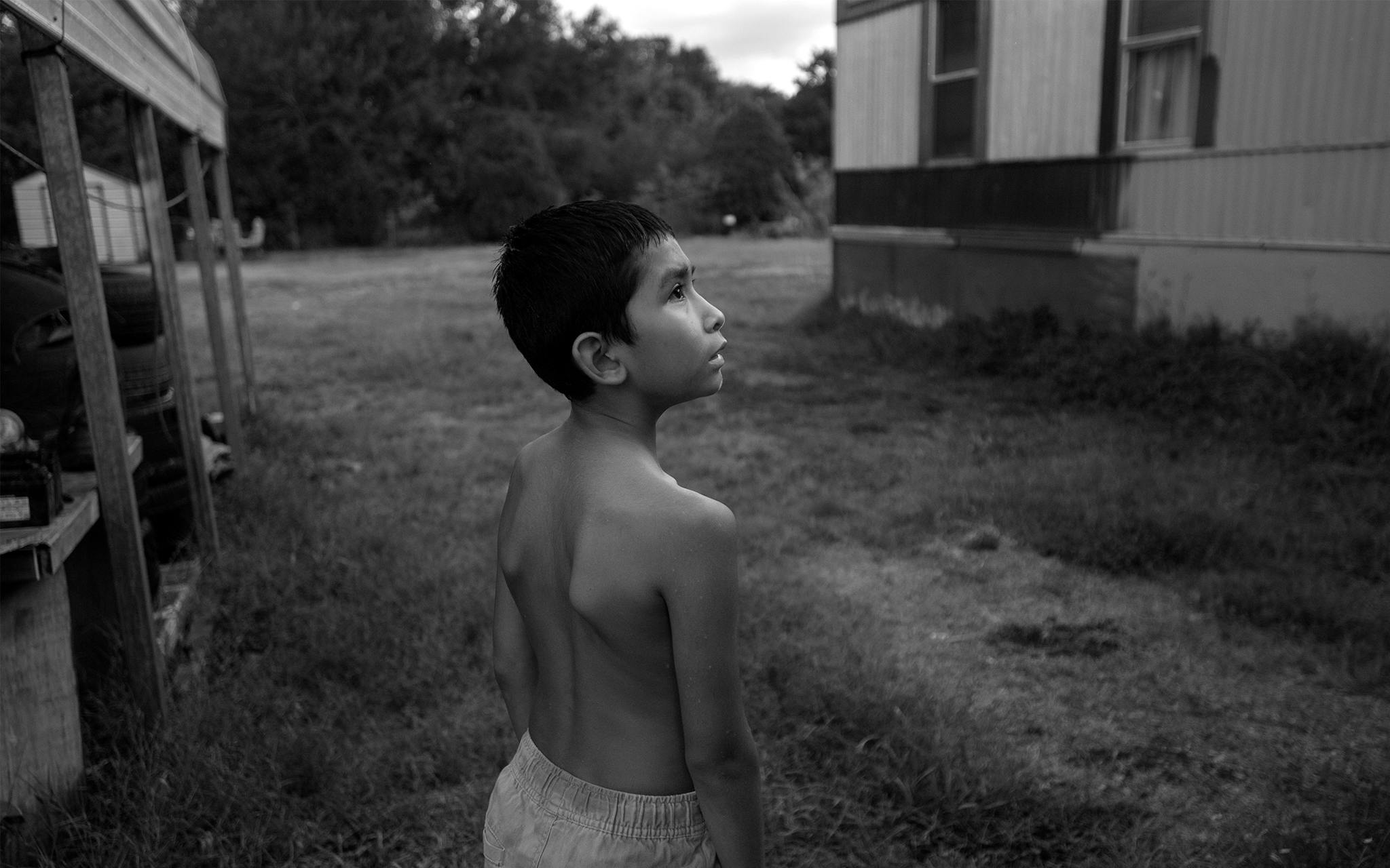 Dan Marino Estrada, 8, the son of Christian’s sister Marianna, stands outside Maricela’s house in Kyle on September 28, 2019.