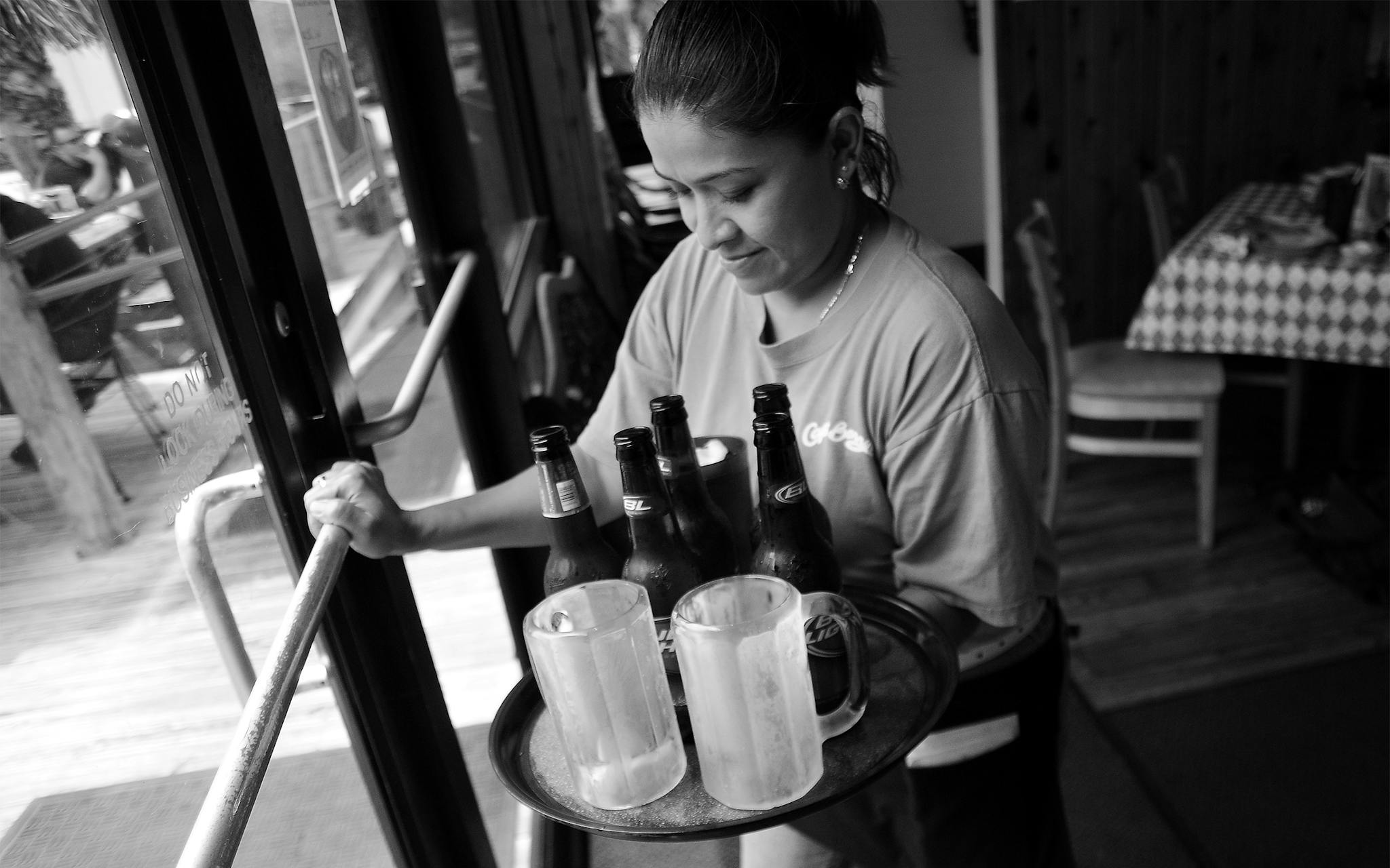 Maricela Juarez, Christian’s mother, works as a waitress at Capt. Benny’s Seafood in Austin on May 5, 2009.