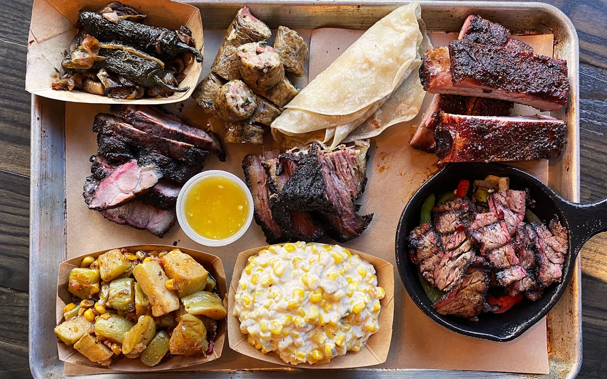 A selection of meats and sides from Burro and Bull in Cypress.