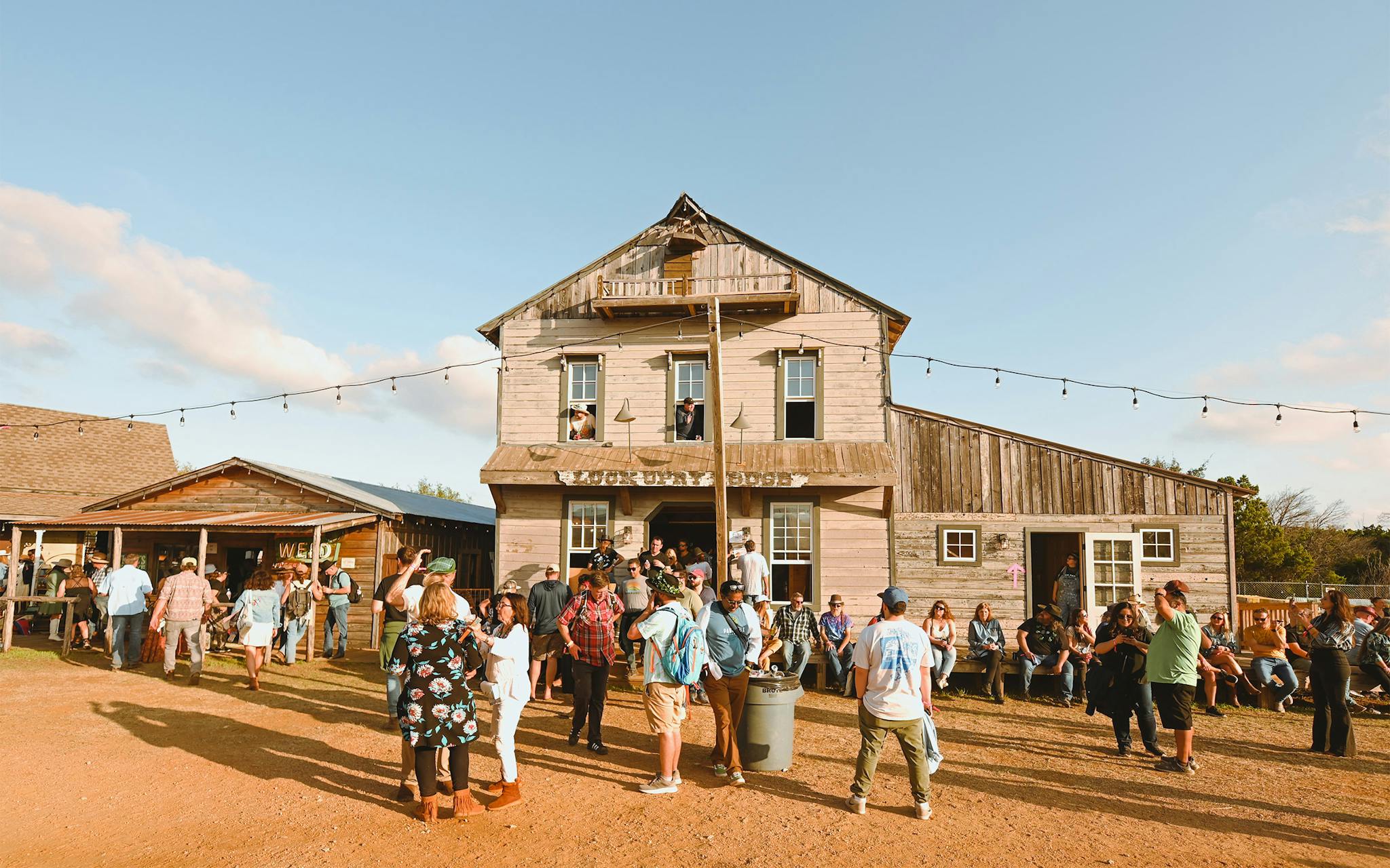 The crowd dips in and out of the Luck Opry House. Originally used for the filming of Red Headed Stranger, it was repurposed for the reunion as the Saloon stage.