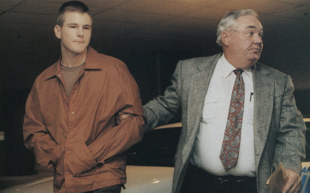 David Graham being escorted to jail for the murder of Adrianne Jones. 