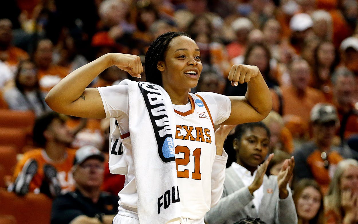 Texas Longhorn forward Aaliyah Moore (21) flexes her muscles after a shot is made against the Utah Utes during the second round game of the 2022 NCAA Women's Basketball Tournament at the Frank Erwin Center in Austin, TX on March 18,2022.