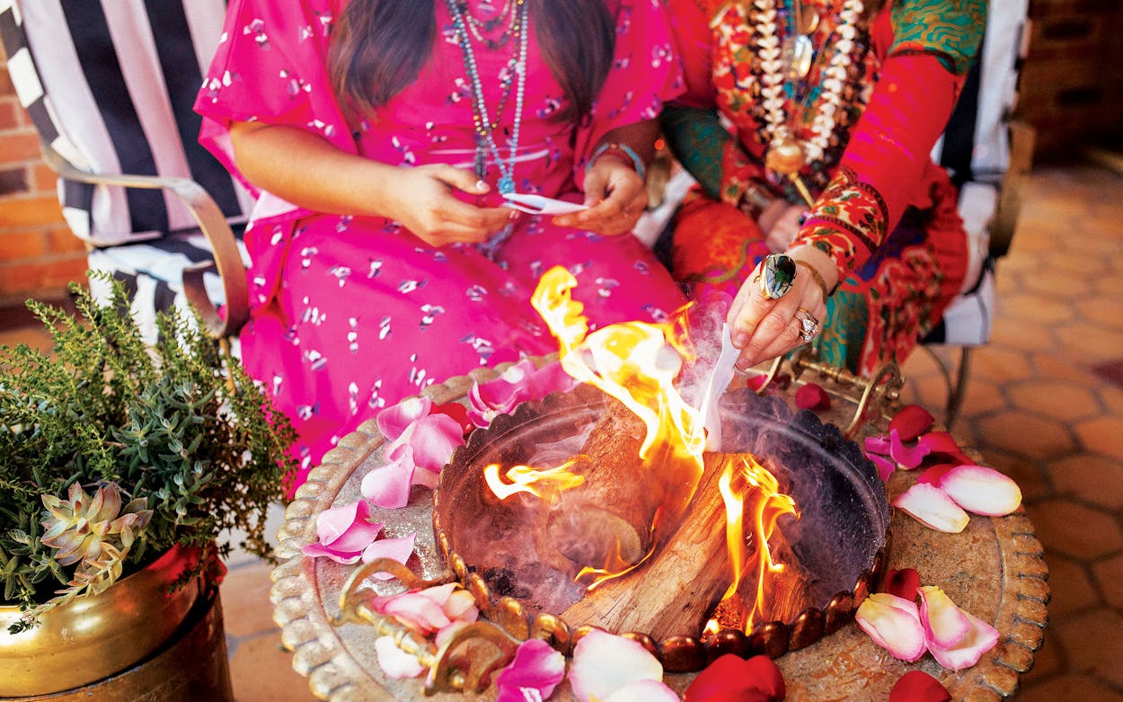 Guests at Hotel Ritual in Jacksonville participate in a burning bowl ceremony.