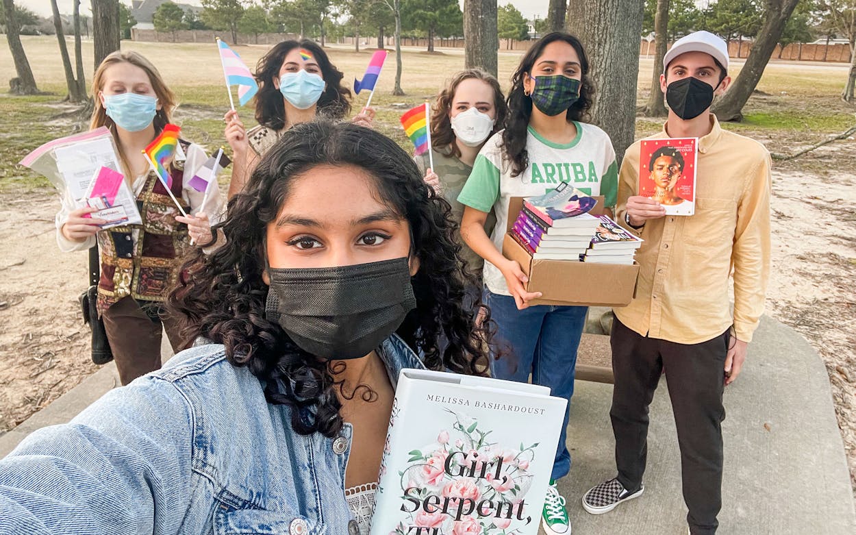 Cameron Samuels (far right) and other Katy ISD students organized a book giveaway to pass out frequently censored books at KISD high schools in February.