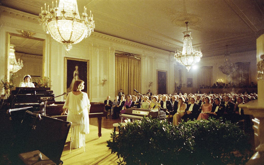 Daryl Dragon and Toni Tennille, of Captain & Tennille, performing at a White House state dinner in honor of Queen Elizabeth and Prince Philip in 1976.