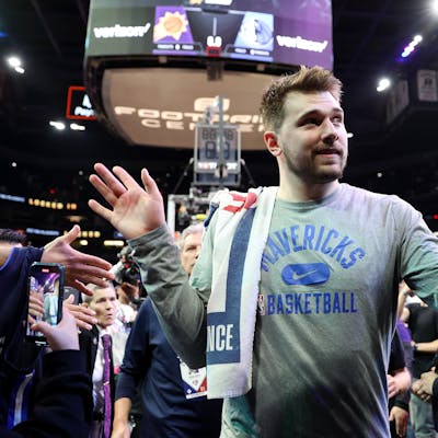Luka Doncic of the Dallas Mavericks leaves the court after defeating the Phoenix Suns 123-90 in Game Seven of the 2022 NBA Playoffs Western Conference Semifinals.
