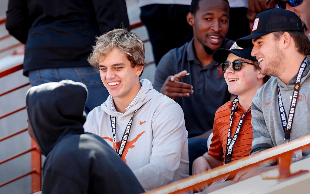 Arch Manning of Isidore Newman School attends the game between the Texas Longhorns and the Oklahoma State Cowboys at Darrell K Royal-Texas Memorial Stadium on October 16, 2021 in Austin, Texas.