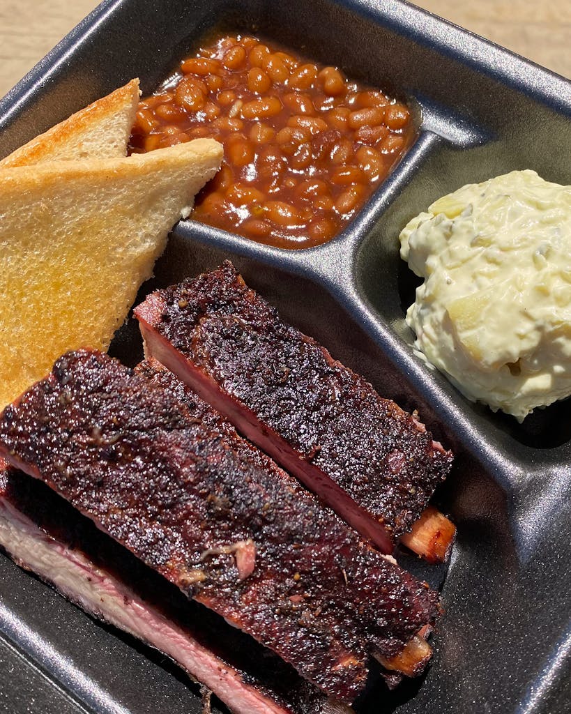 Texas-style ribs with baked beans and potato salad. 