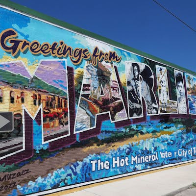 A new mural in Marlin painted on the side of a building at Live Oak and Heritage Row.