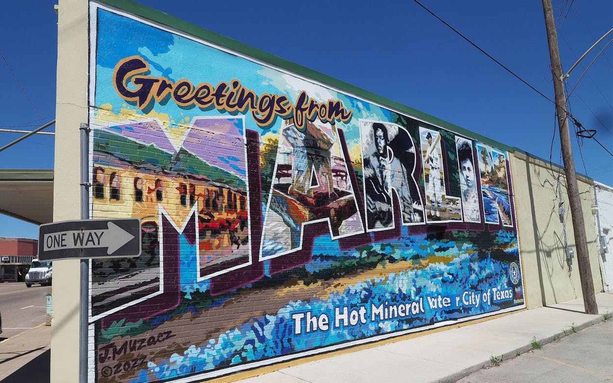 A new mural in Marlin painted on the side of a building at Live Oak and Heritage Row.