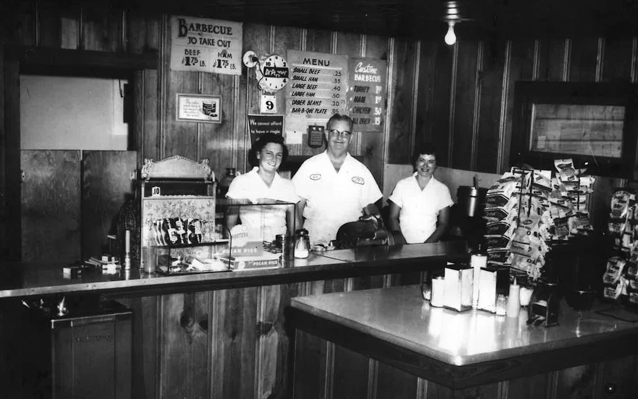Bill Watson behind the counter at Watson's Famous Barbecue.