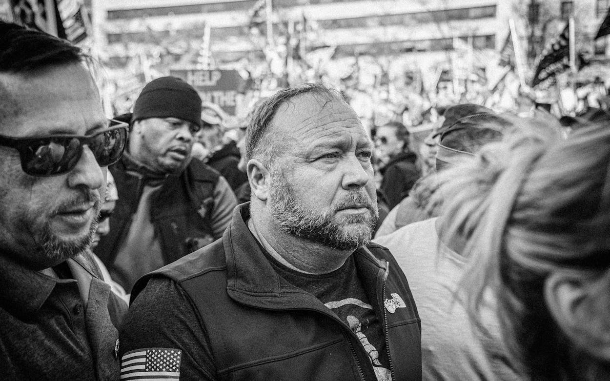 Alex Jones arrives at the Million MAGA March escorted by Proud Boys in Washington, D.C. on November 14, 2020.