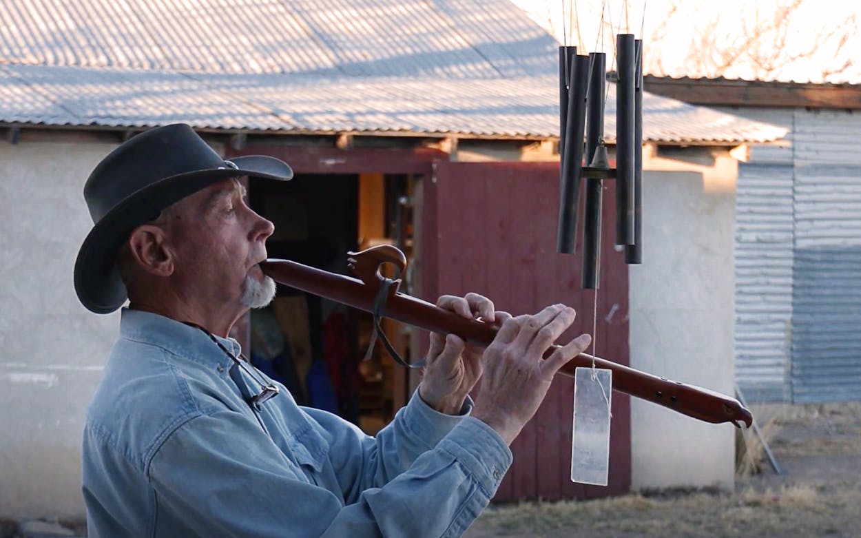 Bob Freeman playing a wooden flute