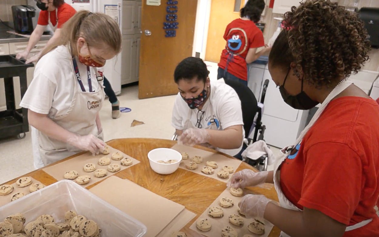 Students baking cookies at West Brook Senior High School in Beaumont.