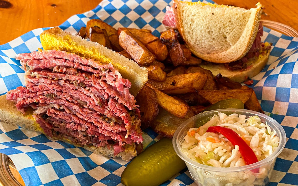 Smoked-meat sandwich with fries at Delibee.