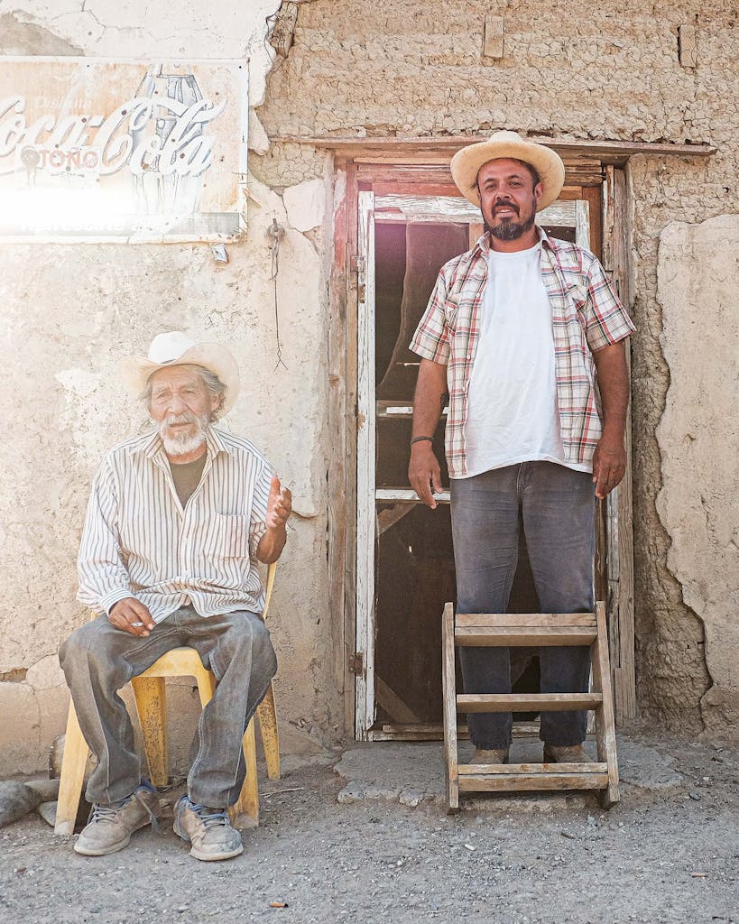 Sandro Canovas (right) with his late mentor Don Manuel Rodriguez Villa at his home in Ojinaga, Chihuahua, in 2018.