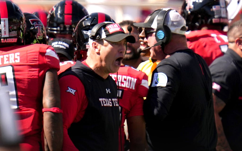Head coach Joey McGuire of the Texas Tech Red Raiders reacts after an interception during the first half against the Texas Longhorns at Jones AT&T Stadium on September 24, 2022 in Lubbock, Texas.