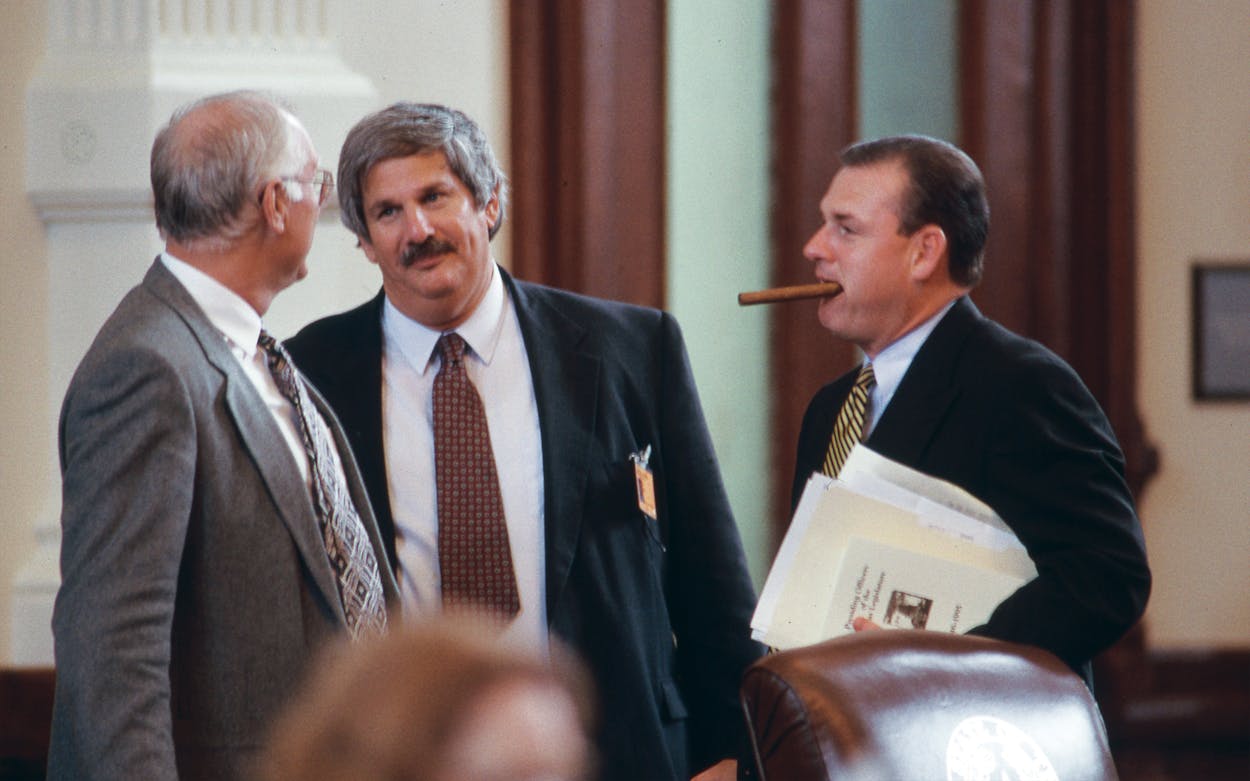 Paul Burka (center) with Representative Tom Uher and Representative Bill Siebert at the Texas capitol during the 1995 legislative session.