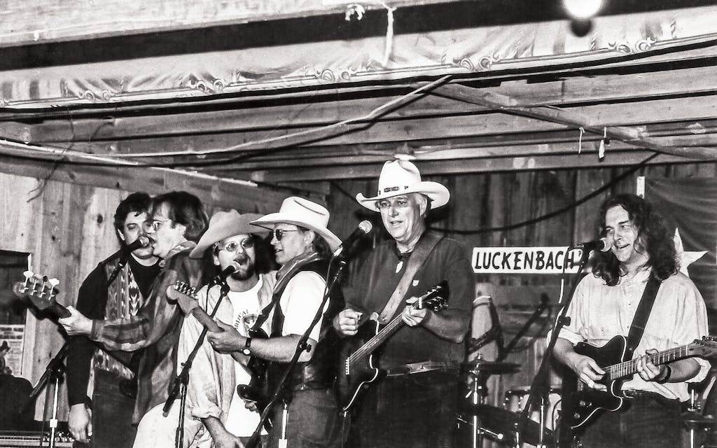 The Lost Gonzo Band and Jerry Jeff Walker performing in the Luckenbach dance hall around 1994.