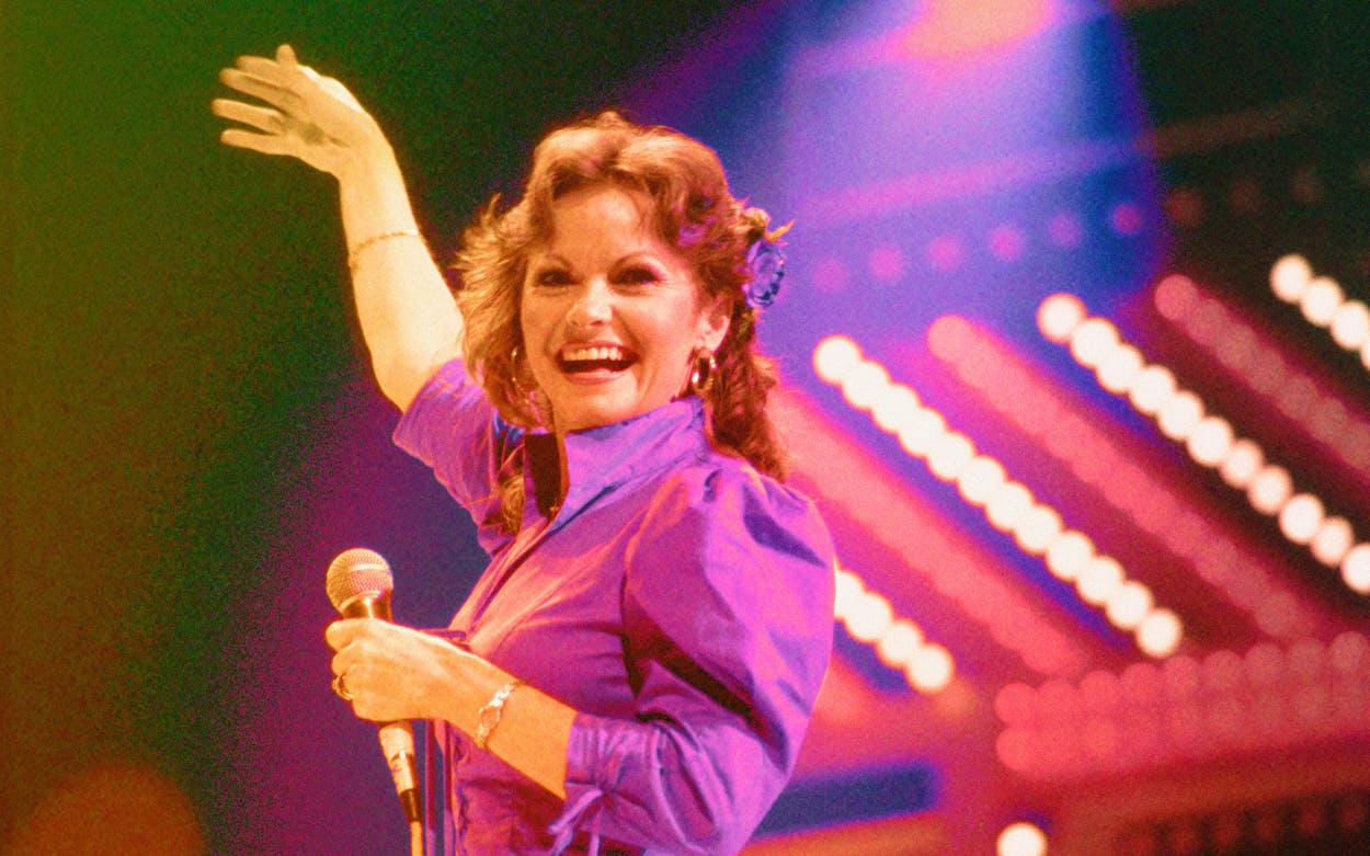 American country singer Jeannie C Riley performs at the International Festival of Country Music at Wembley Arena, London, UK, 12th April 1982.