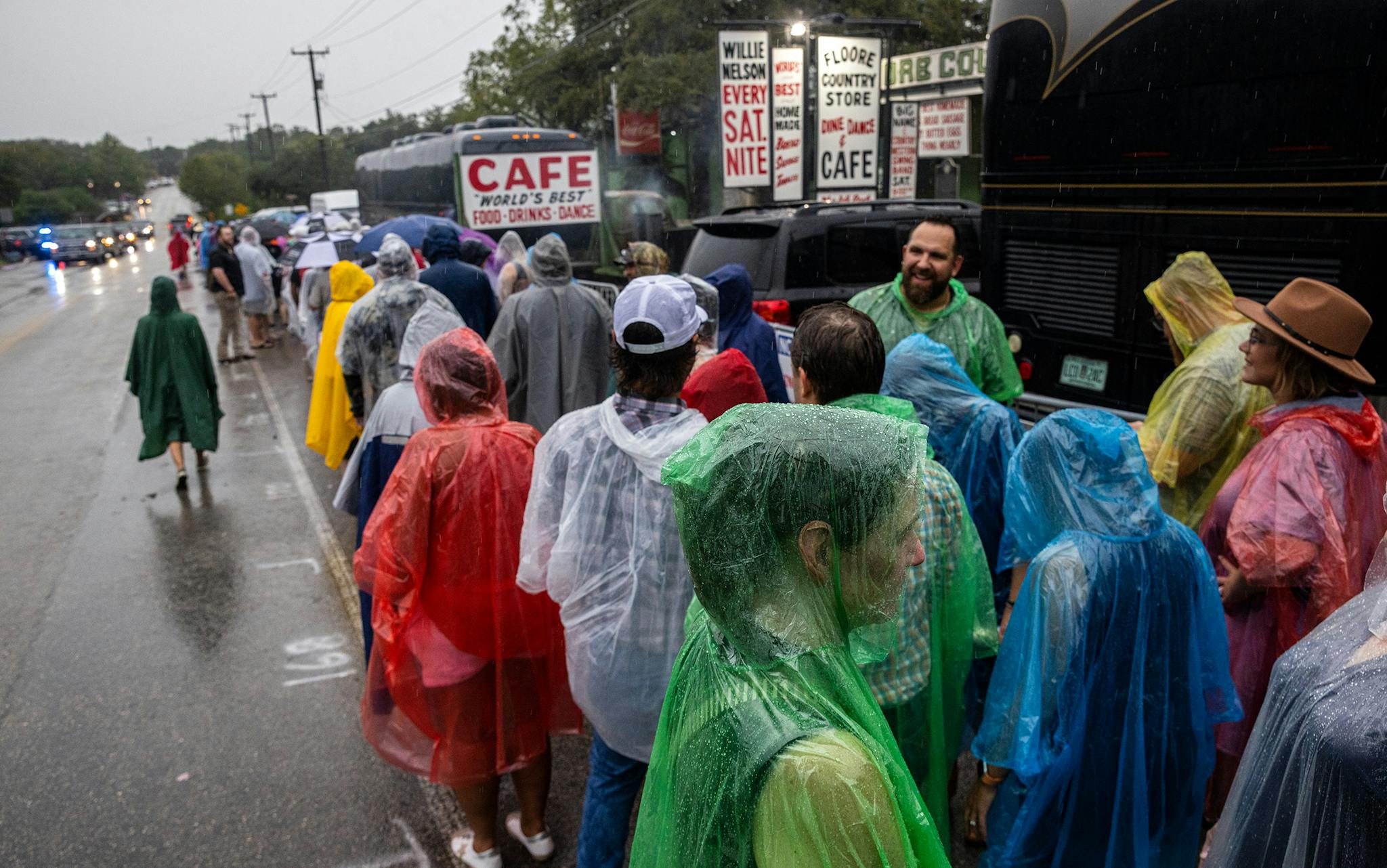 Fans line up in the rain outside of John T. Floore’s Country Store in Helotes, Texas, for Robert Earl Keen’s second to last show on Sept. 3, 2022.