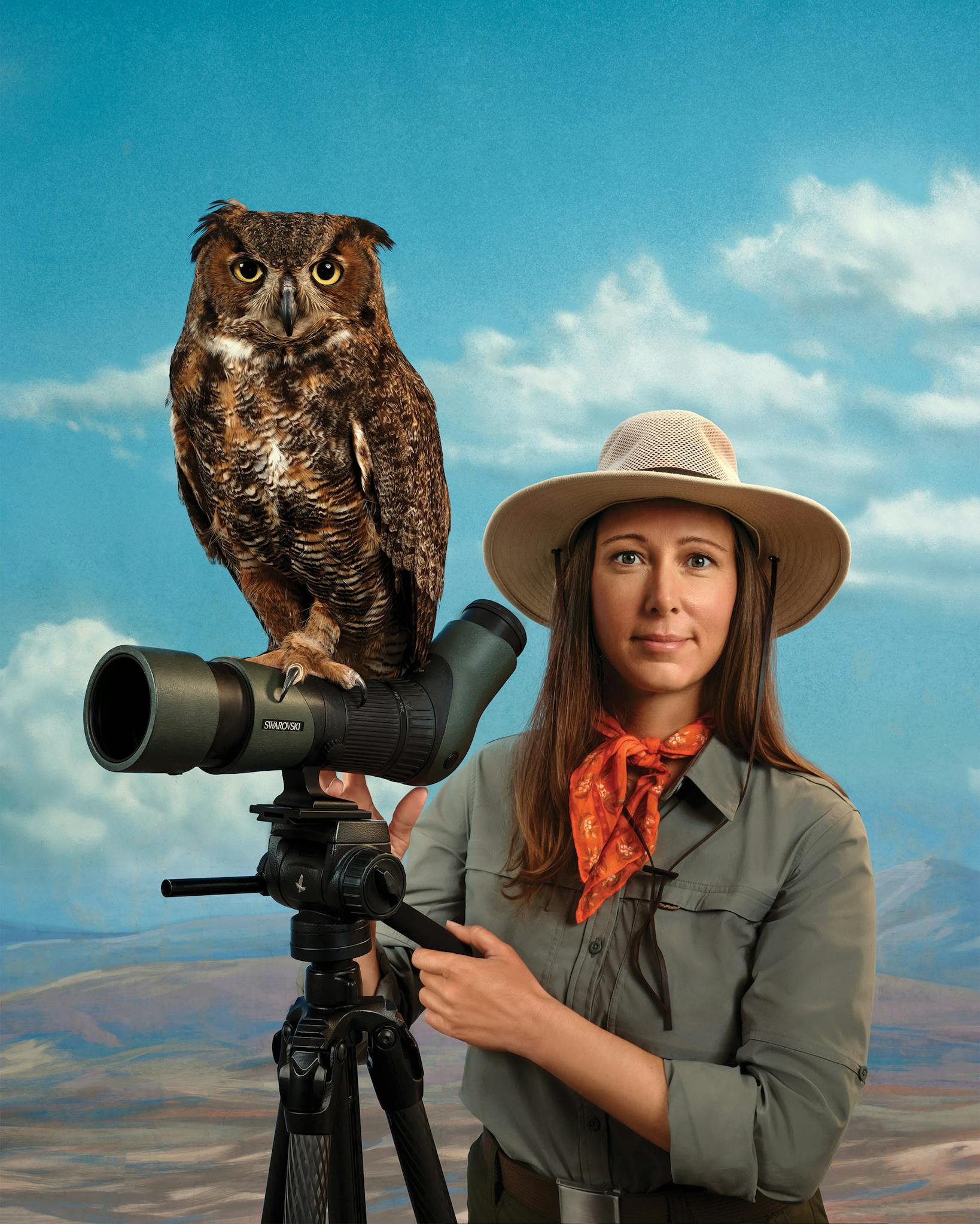 A great horned owl perched on a Tiffany Kersten spotting scope.