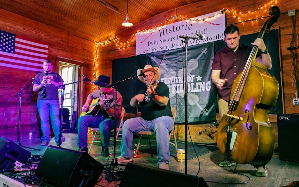 Brian Marshall plays his fiddle at the Festival of Texas Fiddling at Twin Sisters Dancehall in Blanco on December 3, 2022.