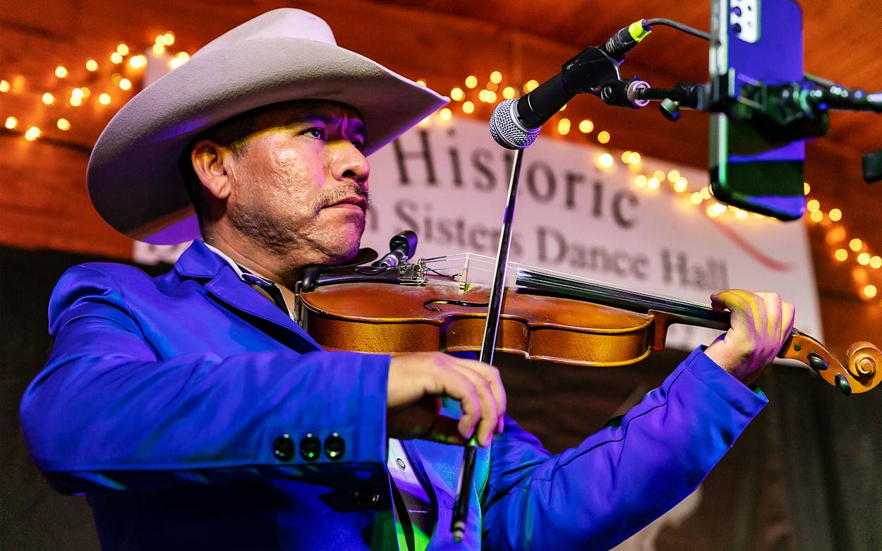 Marcos Acosta of Trio Paseador Hidalguense performs at the Festival of Texas Fiddling at Twin Sisters Dancehall in Blanco on December 3, 2022.