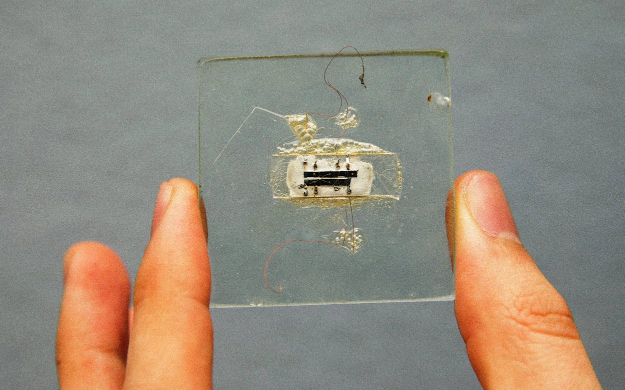 This 1958 prototype integrated circuit mounted on glass was designed by Nobel Prize Physics winner Jack Kilby at Texas Instruments.