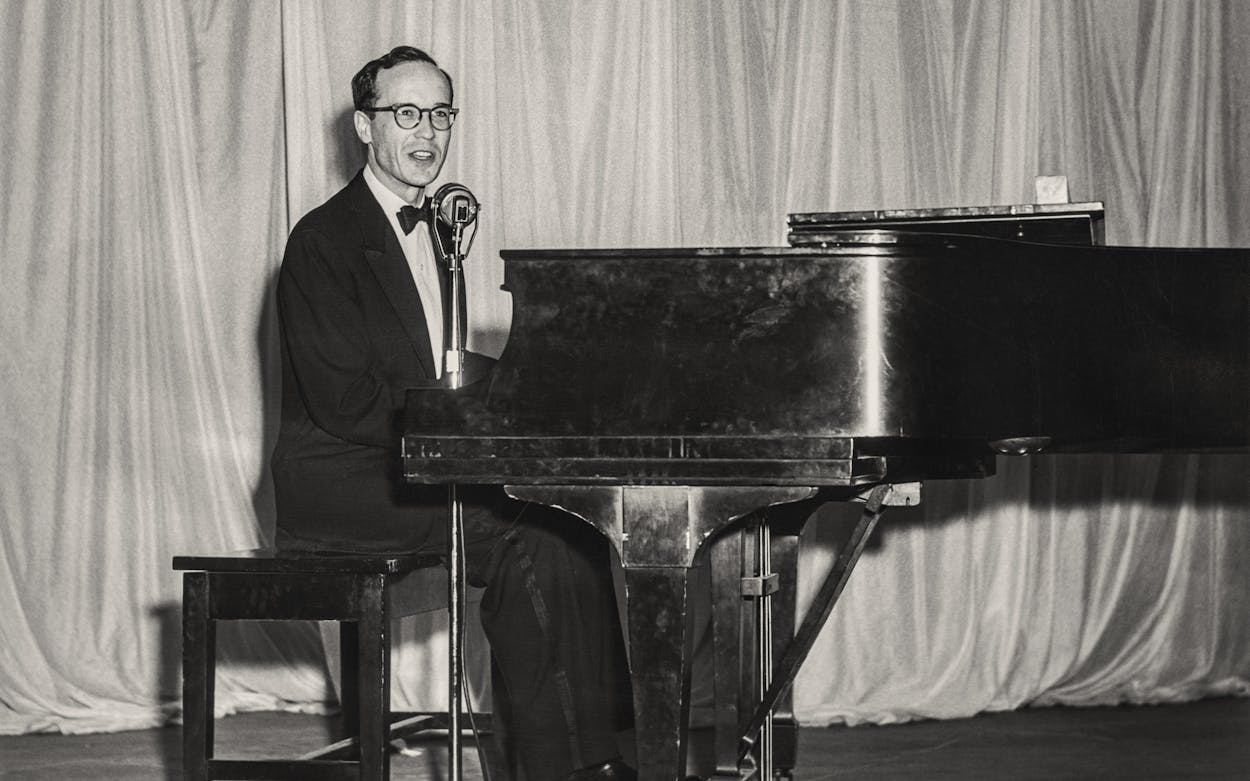 Michael Brown performs solo on a grand piano on stage at Sarah Lawrence College in Bronxville, New York in May 1954.