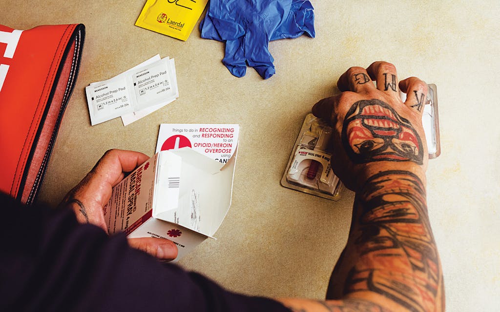 Guerrero displays the contents of an overdose-prevention kit.