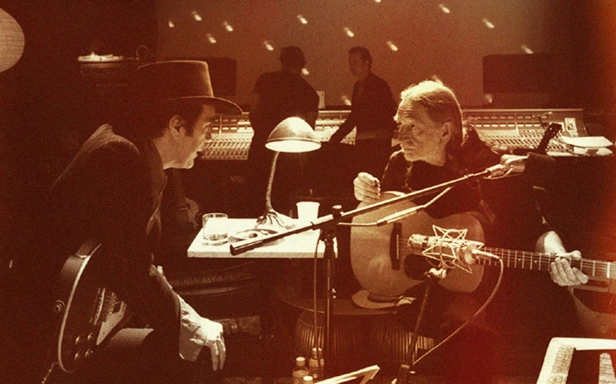 Daniel Lanois and Willie Nelson at the recording of Teatro.