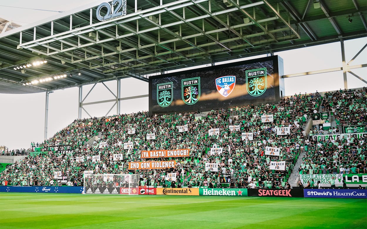 Austin FC fan groups display banners calling for responsible gun laws and naming each of the victims at a June 2022 game.