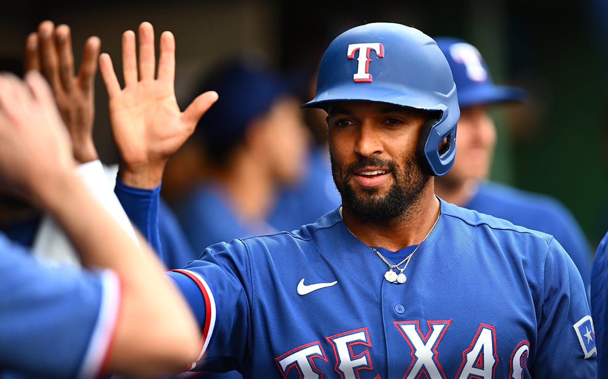 Rangers second-baseman Marcus Semien celebrates after scoring a run against the Pittsburgh Pirates on May 23, 2023.