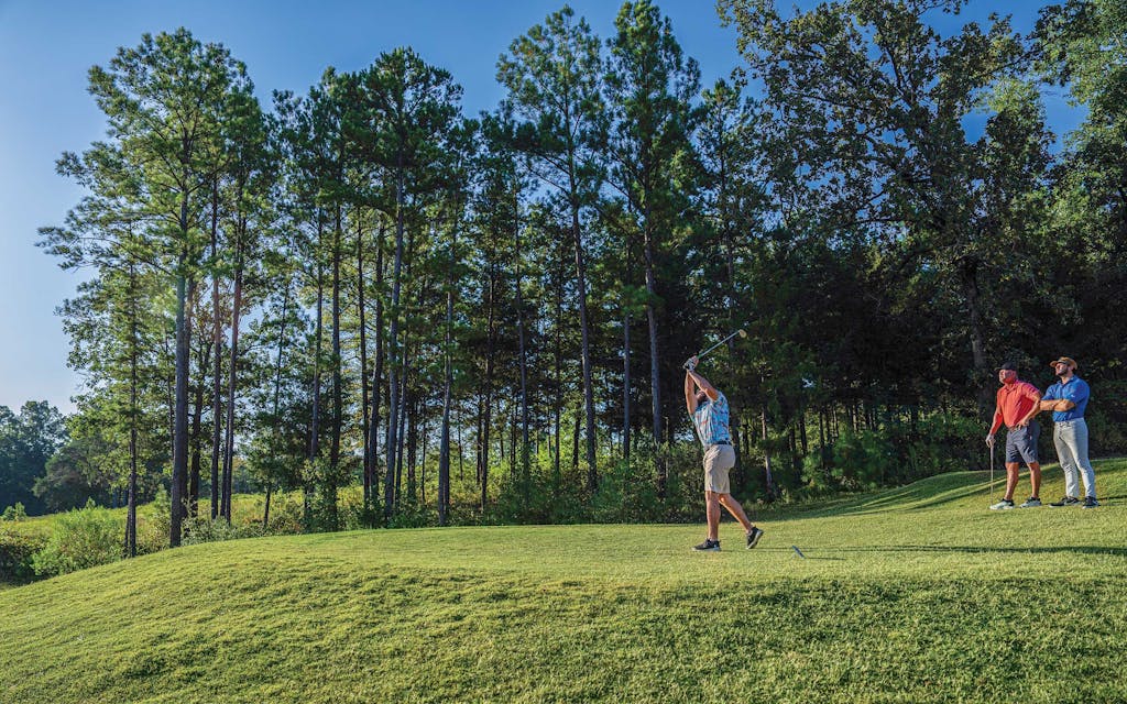 A player taking on the fourth hole at Tempest, in Gladewater.