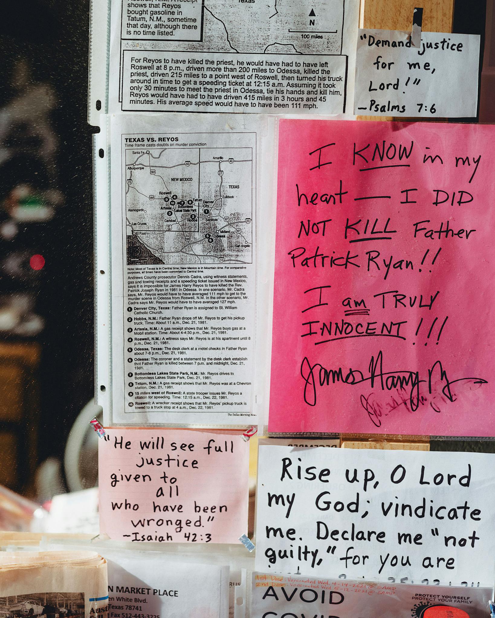 A sign taped to Reyos' mirror reads "I KNOW in my heart—I DID NOT KILL Father Patrick Ryan!! I am TRULY INNOCENT!!!"