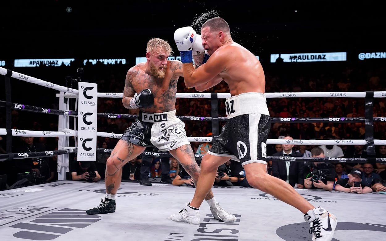 Jake Paul throws a left at Nate Diaz during the sixth round of their fight at the American Airlines Center on August 05, 2023 in Dallas, Texas.
