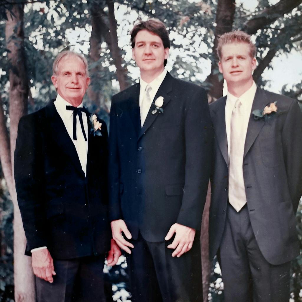Bruce and Charlie with their dad, Gerald, October 1996.