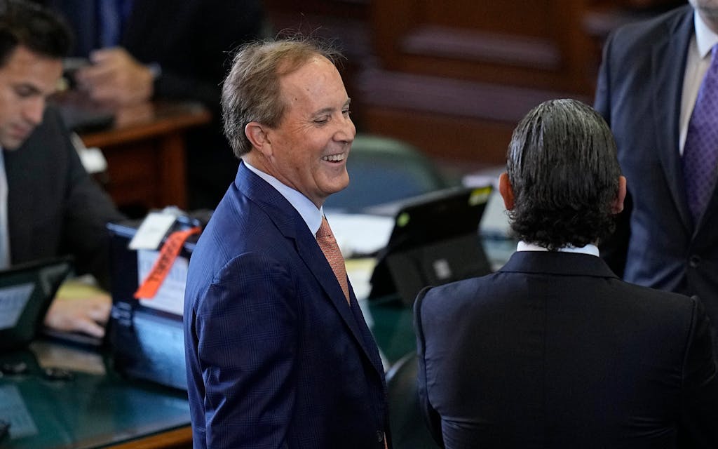 Texas state Attorney General Ken Paxton, left, talks with his attorneys before his impeachment trial for Texas Attorney General Ken Paxton in the Senate Chamber at the Texas Capitol, Tuesday, Sept. 5, 2023, in Austin, Texas.